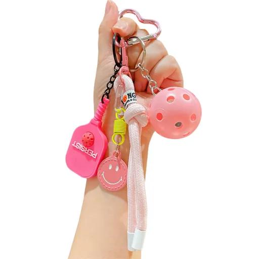 1 Piece Pickleball Keychain Bag Charm - Pink Sports Pendant with Mini Paddle, Ball, Smiley Charm and Woven Cord, Cute Gift Friendly Key Ring for Bags, Backpacks and Keys