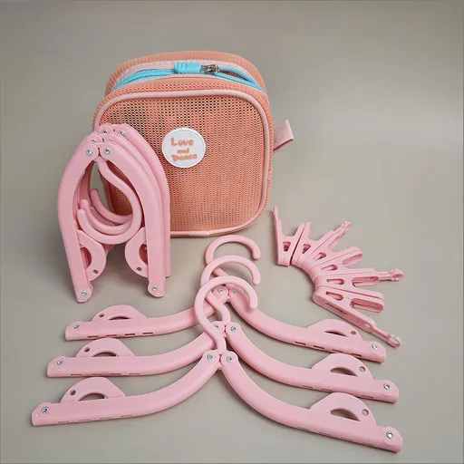 Foldable Travel Hangers with Storage Bag – 10-Piece Compact Clothes Hanger Set for Hotel, Dorm & Home Use (Pink) | Other Colors Available in Store