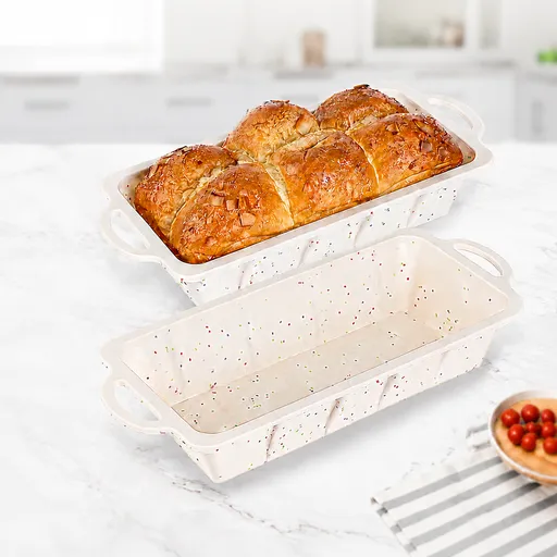 Wholesome Home-Baked Loaves Made Effortlessly with This Flexible Silicone Bread Pan, Perfect for Banana Bread, Meatloaf, Pound Cake, and More — Non-Stick, Even-Heating, and Built to Last with a Reinforcing Stainless Steel Frame to Keep Its Shape Bake