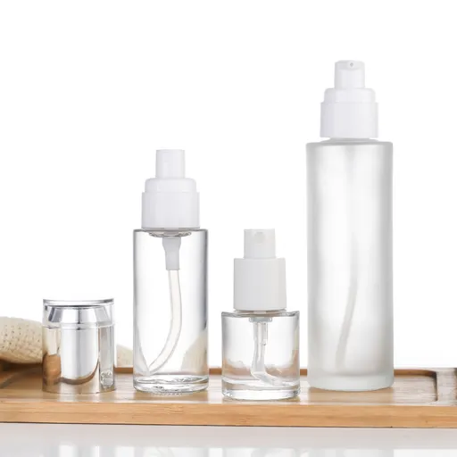 4 Pack Refillable Cosmetic Pump and Spray Bottles with Clear Bodies for Lotion, Shampoo, Soap and Travel Toiletries, White