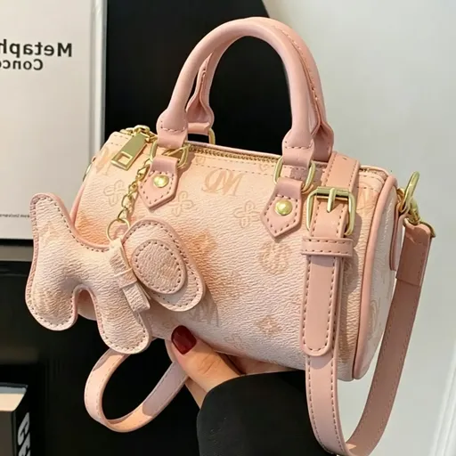 Classic Monogram Pillow Bag: Premium PU Leather with Luxe Feel, Cute Pet Charm for a Playful Touch, Compact Size Fits Phone, Multiple Carry Ways, Versatile for Commute & Dates./pink
