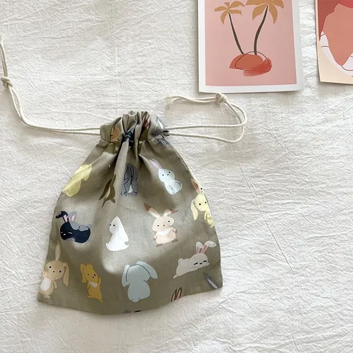 Travel Storage Cotton Bag Drawstring Multi-Purpose. Gray background bunny-cotton material