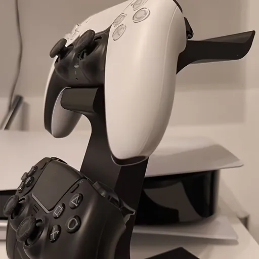 black 3-in-1 PS5 and Xbox Controller Stand – Compatible with PlayStation 5/Xbox Consoles. A gaming desktop organizer with a headphone hanger, non-charging base that holds 2 controllers and headphones. Space-saving white/black console accessory.